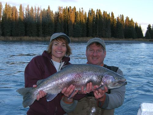 Cindy and a trophy Rainbow catch from the Kenai River