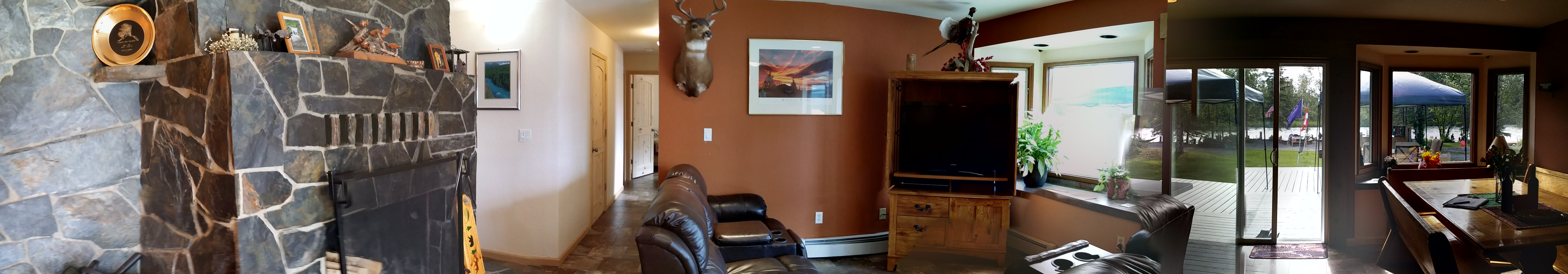 Living room panorama with Kenai River view.